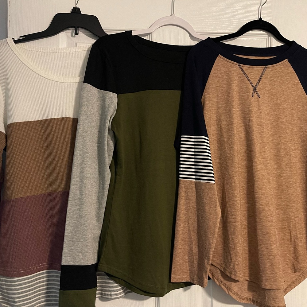 Long sleeve shirts, different patterns. Size medium